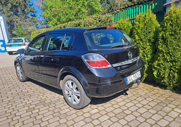 Opel Astra cena 8000 przebieg: 322534, rok produkcji 2009 z Szczecin małe 56